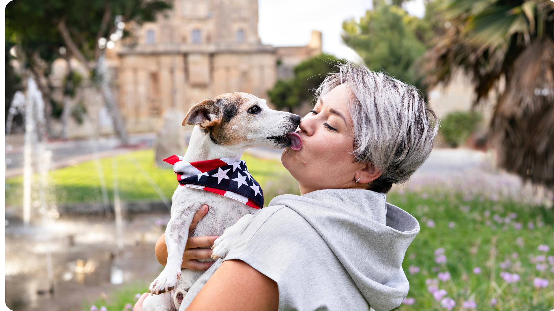Woman with her dog in a park